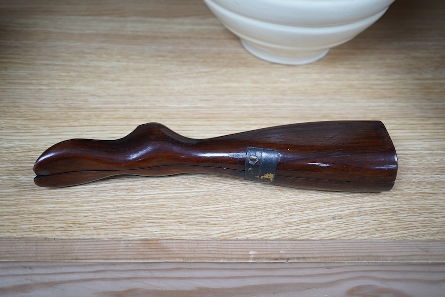 A Victorian rosewood 'ladys foot' etui holding a pair of steel bootpulls with additional tools to the handle, 26.5cm. Condition - good